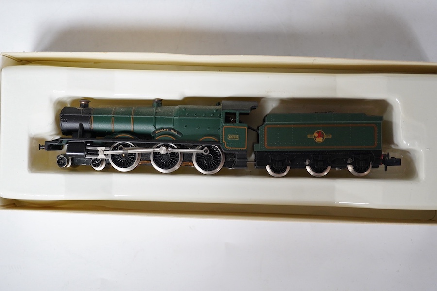 Three boxed Graham Farish N gauge BR locomotives; a Hall Class, Baggrave Hall 6994 (140A), a Hall Class 7315 (1405), and a Class 94xx pannier tank 9401 (1105). Condition - good.